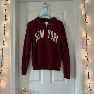 Burgundy women’s “New York” quarter zip